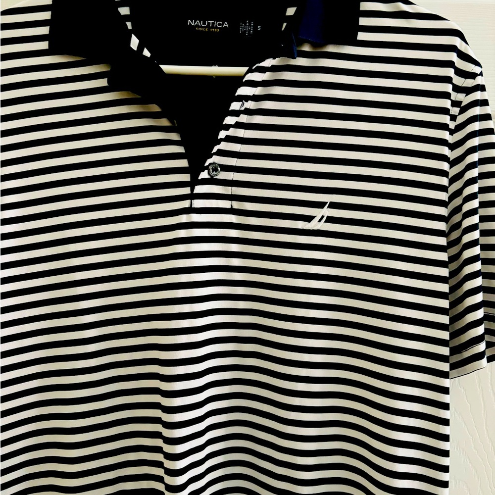 Nautica Polo shirt Sz S by can be worn medium.